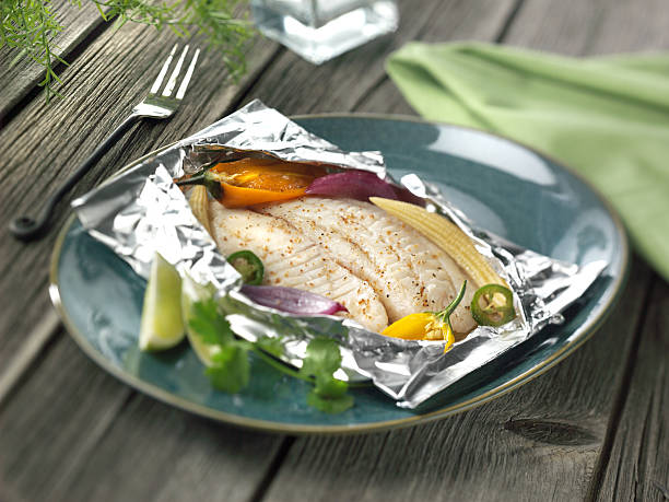 FOIL BAKED SEA BASS: ELEGANT SEAFOOD FEAST AT HOME
