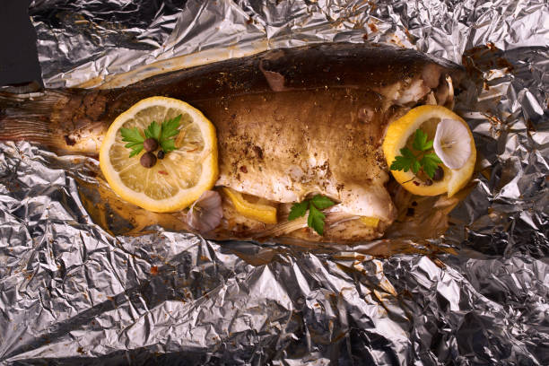 CHARCOAL GRILLED FISH IN FOIL: A GUIDE TO FIRE AND RUSTIC FLAVOR